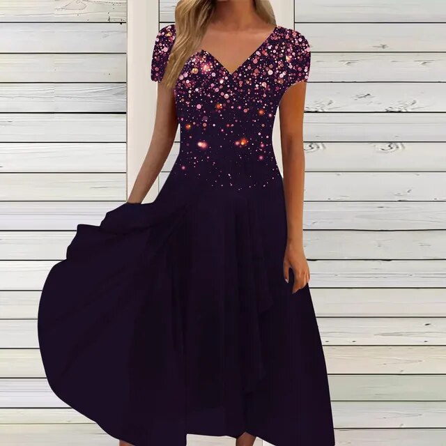 LP | Maxi abito fluido con scollo a V e motivo floreale