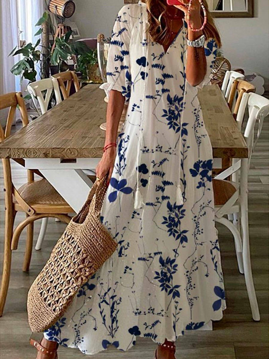 LP | Maxi abito blu con scollo a cuore floreale