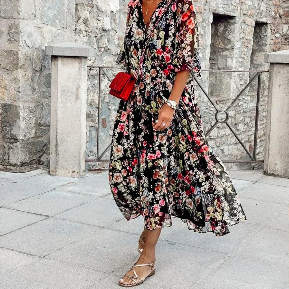 LP | Maxi abito con scollo a V e motivo floreale