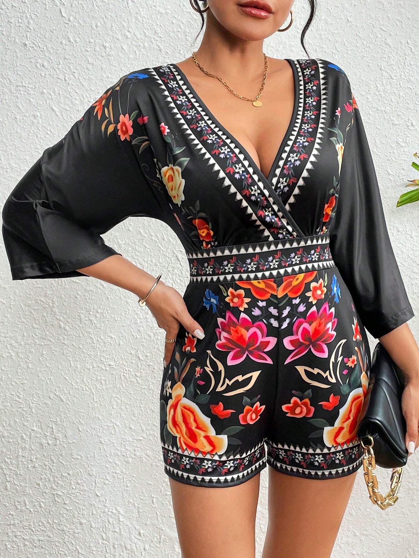 LP | Romper elegante con stampa floreale