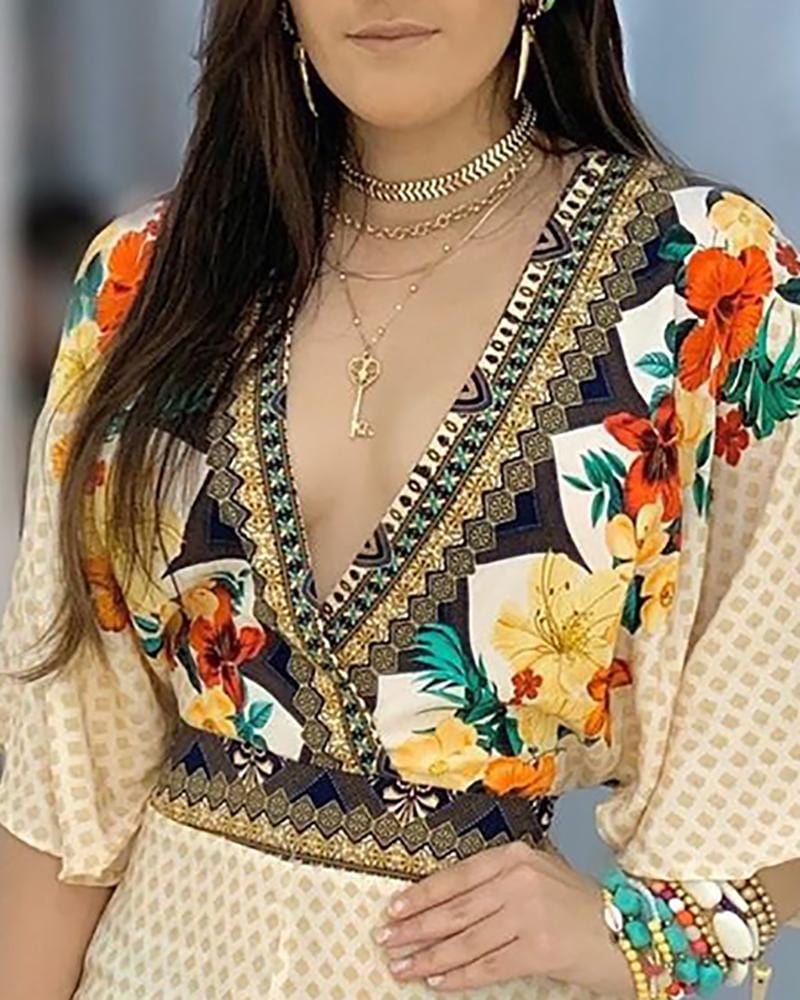 LP | Romper elegante con stampa floreale