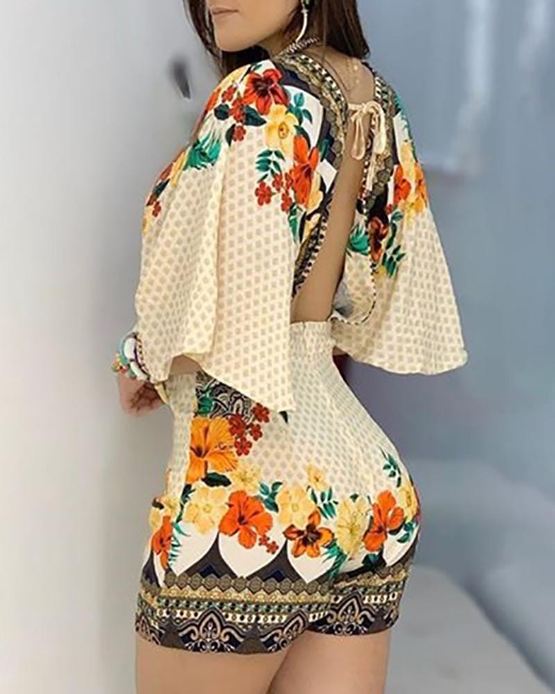 LP | Romper elegante con stampa floreale
