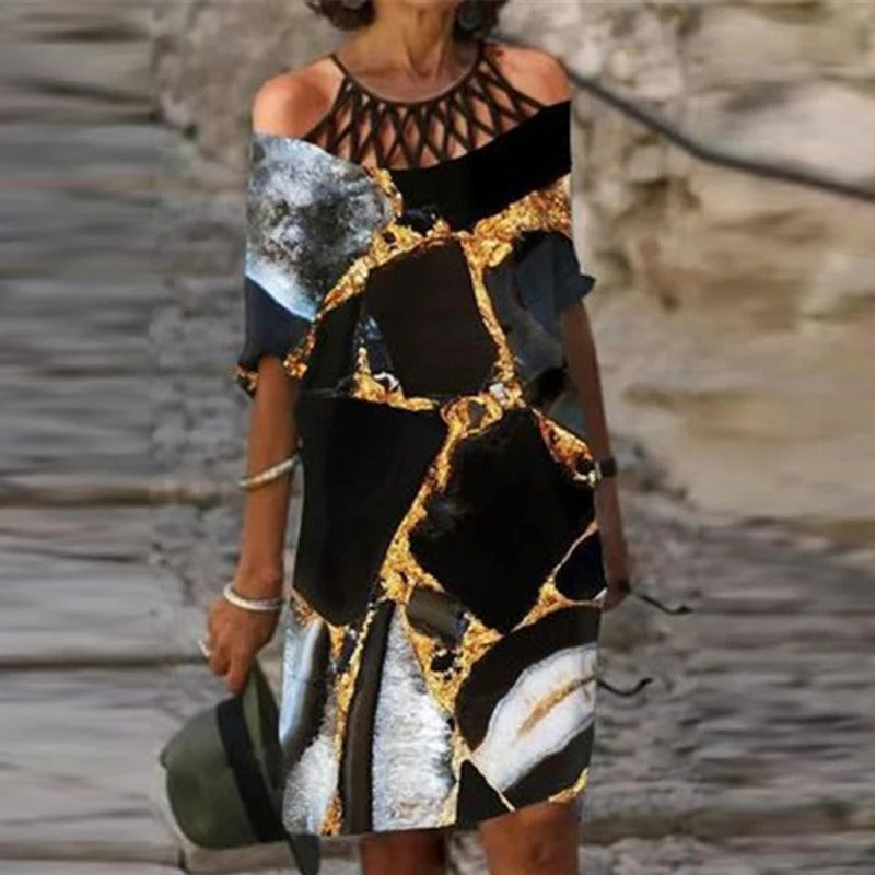 LP | Abito midi verde con scollo a V e motivo floreale