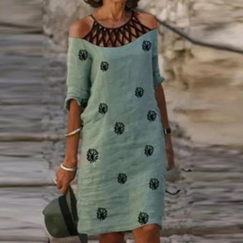 LP | Abito midi verde con scollo a V e motivo floreale