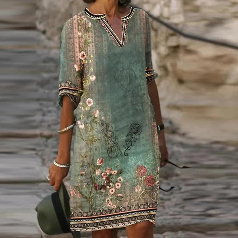 LP | Abito midi verde con scollo a V e motivo floreale
