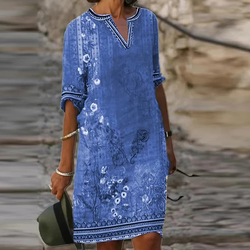 LP | Abito midi verde con scollo a V e motivo floreale