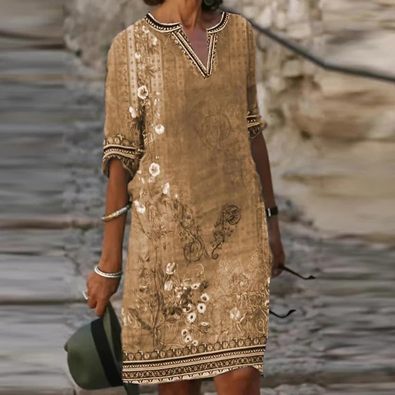 LP | Abito midi verde con scollo a V e motivo floreale