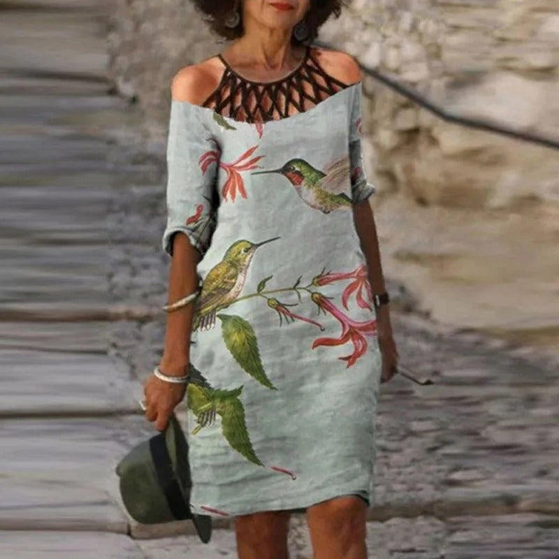 LP | Abito midi verde con scollo a V e motivo floreale