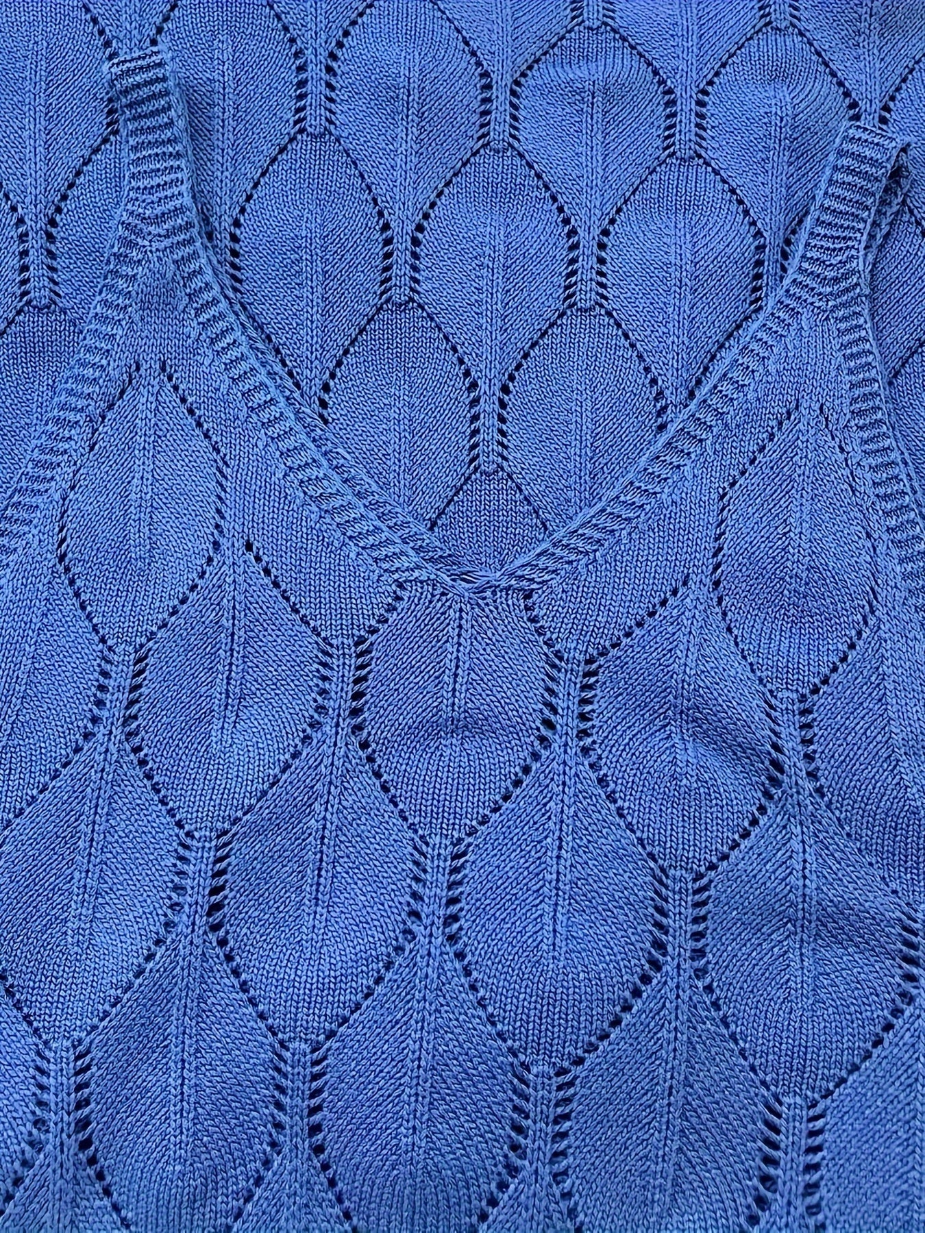 LP | Abito lungo senza maniche in maglia con stile cappotto