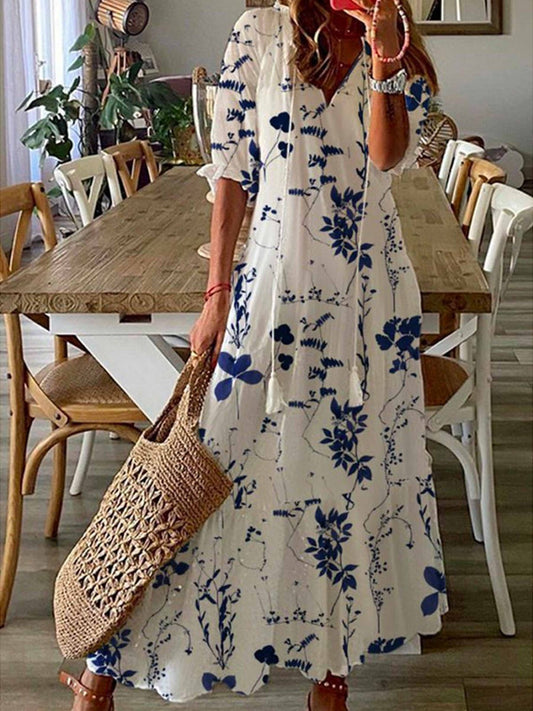 LP | Maxi abito blu con scollo a cuore floreale