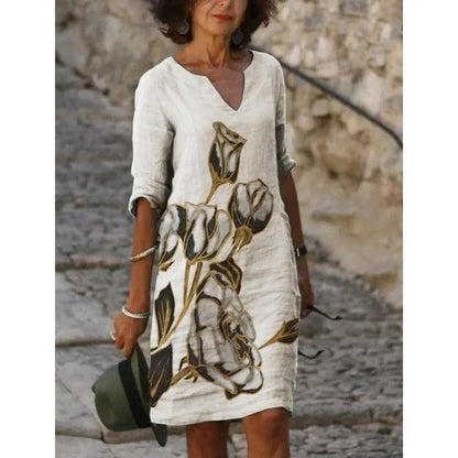 LP | Abito midi con scollo a V e motivo floreale